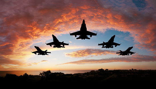 U.S.A. Air Force Fighter Jet Flying in formation, in the afternoon.