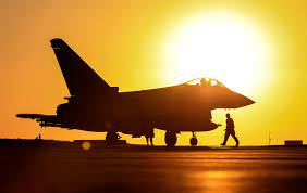 U.S.A. Air Force Fighter Jet Stationary. Sunset In background.